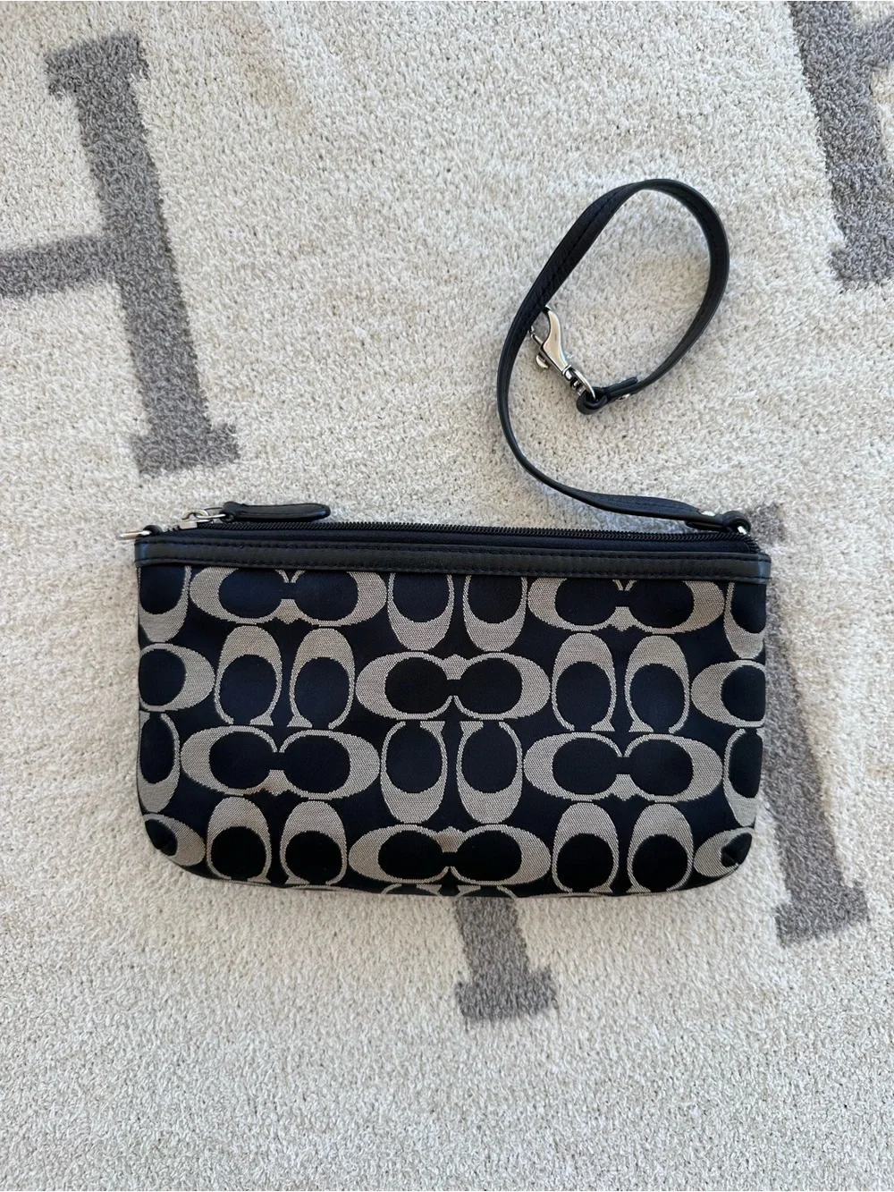 COACH Black Signature print wristlet